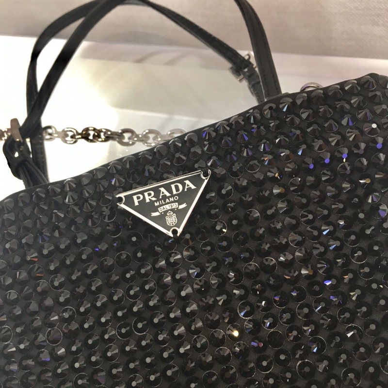 Pra*a top handle bags